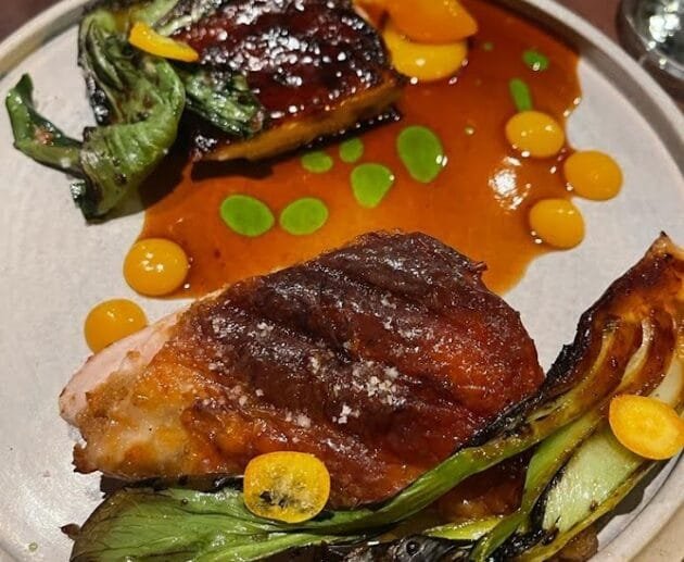 Crispy Chicken Thighs with Charred Bok Choy & Kumquat Reduction