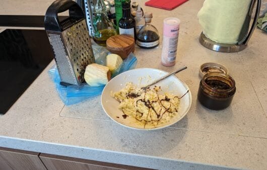 Scrambled Eggs with Grated Vegan Cheese & Balsamic Drizzle