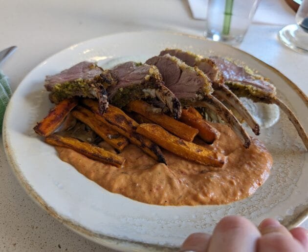Herb-Crusted Rack of Lamb with Roasted Carrot Fries & Smoky Red Pepper Sauce
