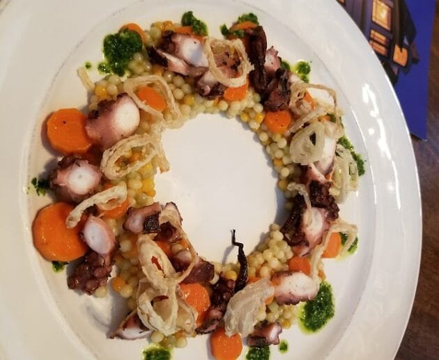 Grilled Octopus with Pearl Millet, Carrot Medallions & Herb Drizzle