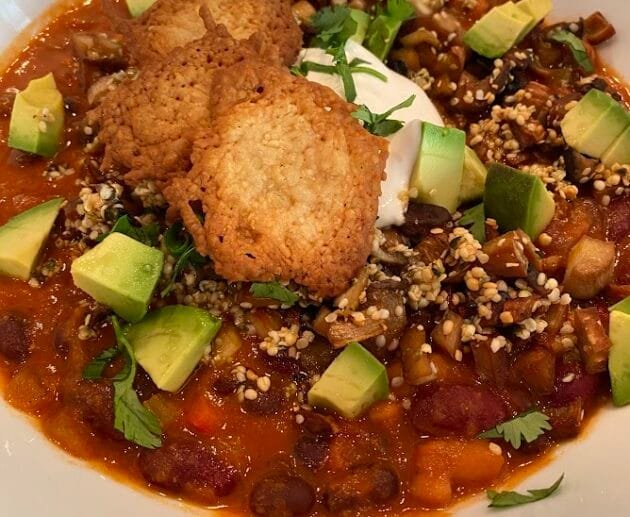 Hearty Vegan Chili Bowl with Avocado & Crispy Quinoa Crunch