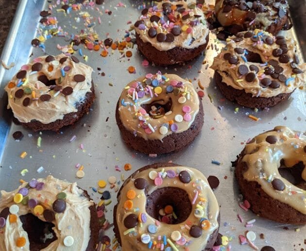 Baked chocolate donuts with nut butter frosting