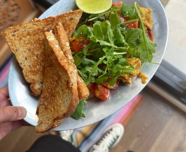 Scrambled Eggs with Cherry Tomatoes and Fresh Arugula