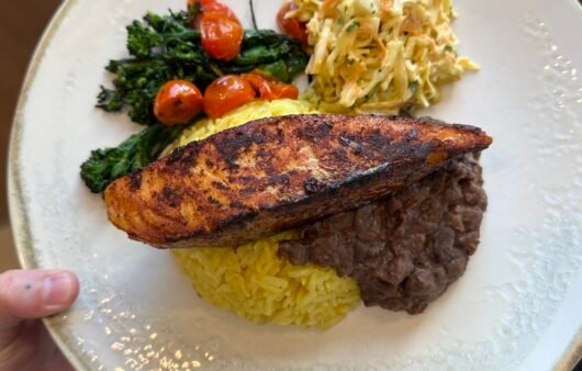 Blackened Salmon with Saffron Rice, Black Beans, and Roasted Vegetables