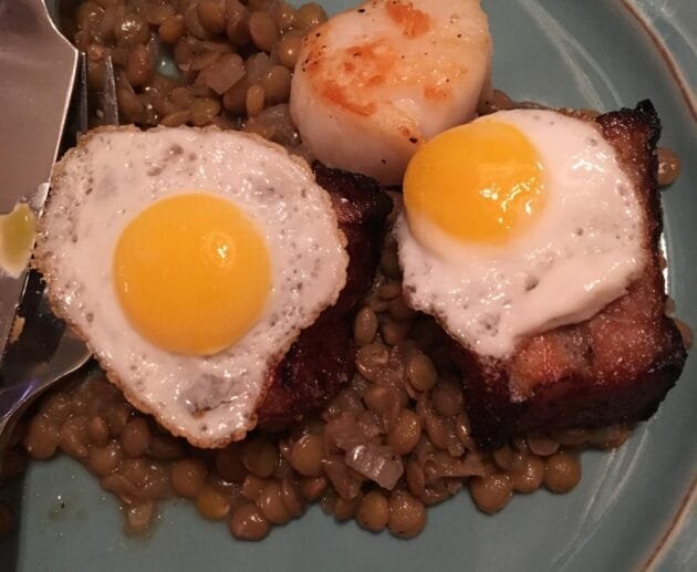 Seared Scallop & Pork Belly with Sunny Quail Eggs Over Garlic Lentils