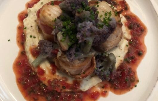 Prosciutto-Wrapped Scallops with Purple Cauliflower & Roasted Red Pepper Vinaigrette