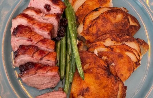Seared Duck Breast with Cherry Glaze, Crispy Potato Stacks & Sautéed Green Beans