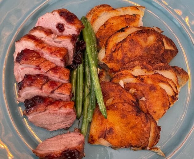 Seared Duck Breast with Cherry Glaze, Crispy Potato Stacks & Sautéed Green Beans