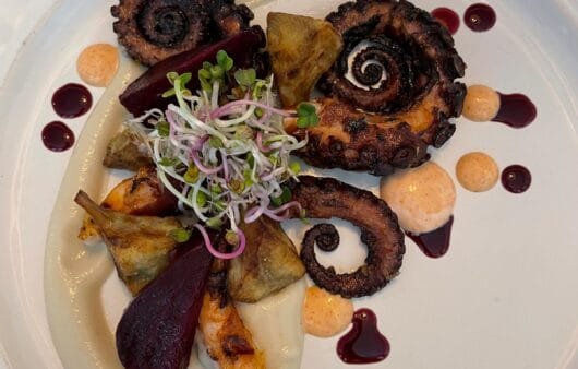 Grilled Octopus with Cauliflower Purée, Roasted Beets & Microgreens