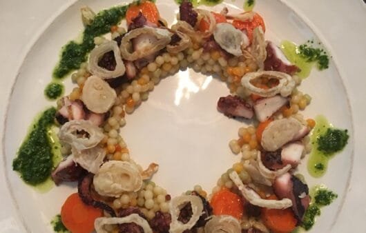 Grilled Octopus with Pearl Millet, Carrot Medallions & Herb Oil