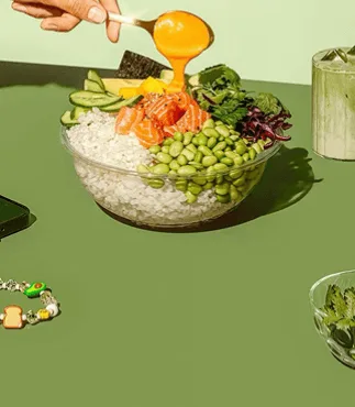 Gluten-free dairy-free poke bowl with rice, salmon, edamame, and fresh vegetables, healthy lunch recipe